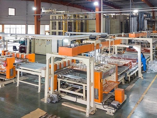 Automated FRP composite panel manufacturing line